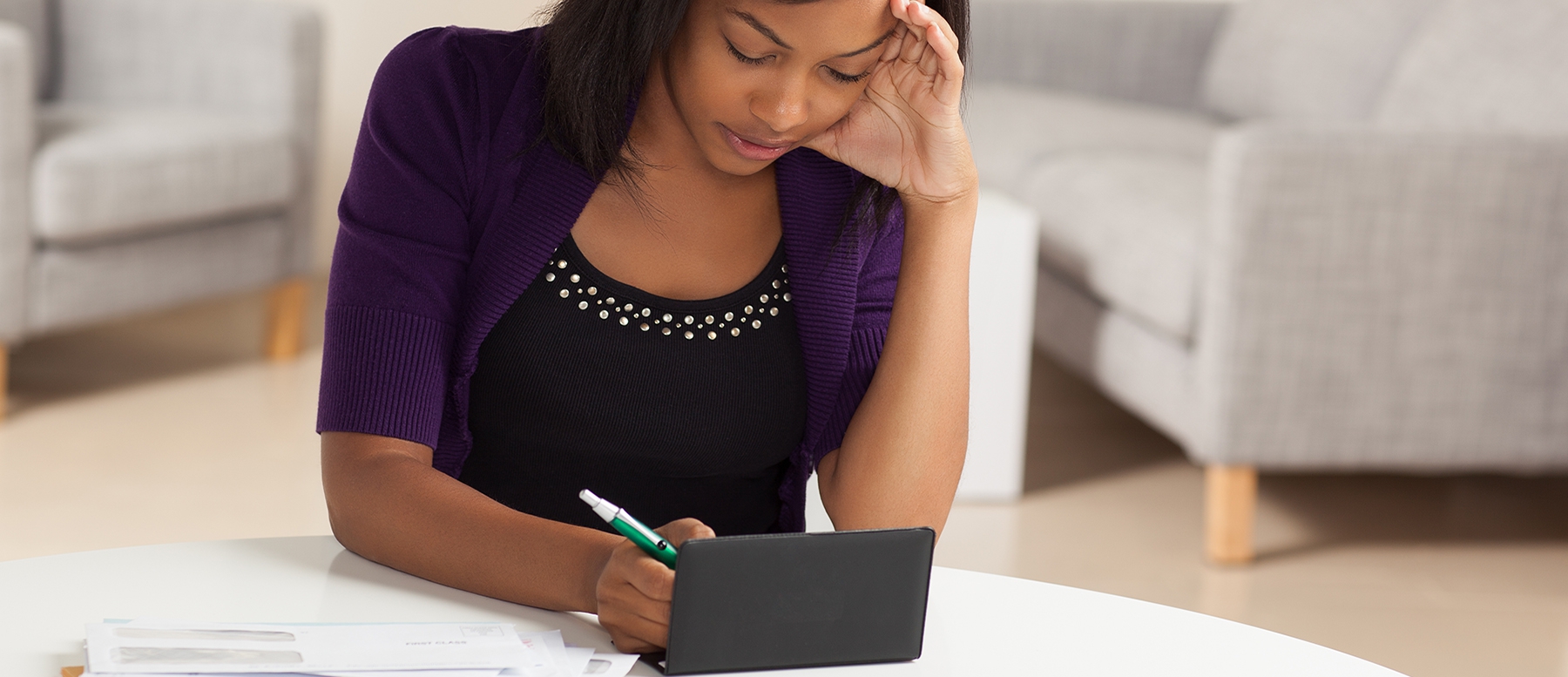 Women writing a check