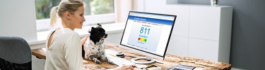 Women viewing credit score on computer