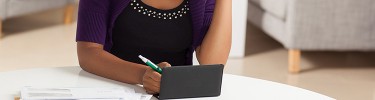 Women writing a check