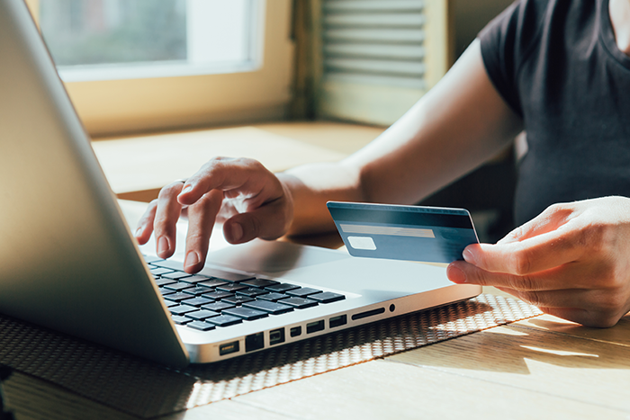 hand holding credit card